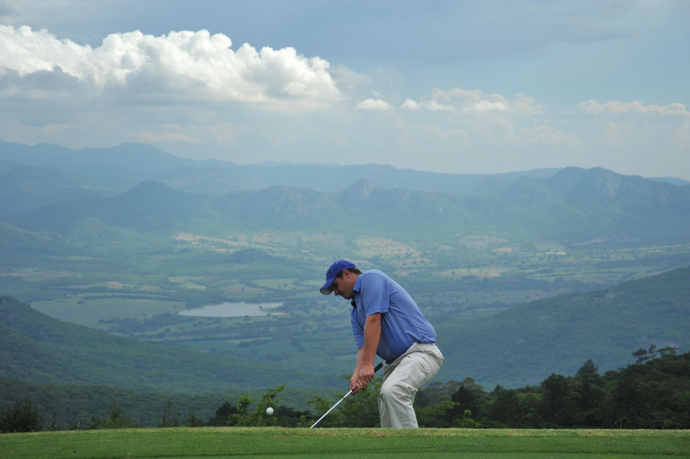 Teeing off above the Burma Valley