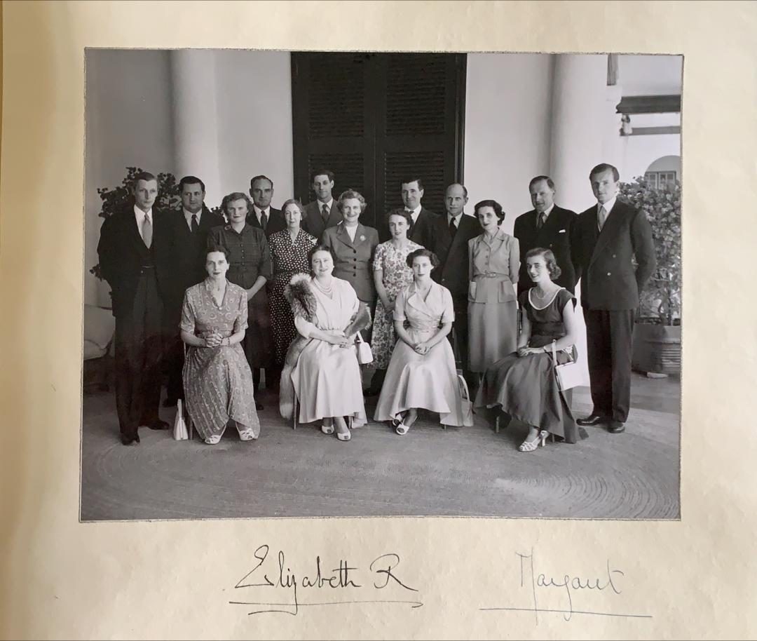A group photograph signed Elizabeth R and Margaret